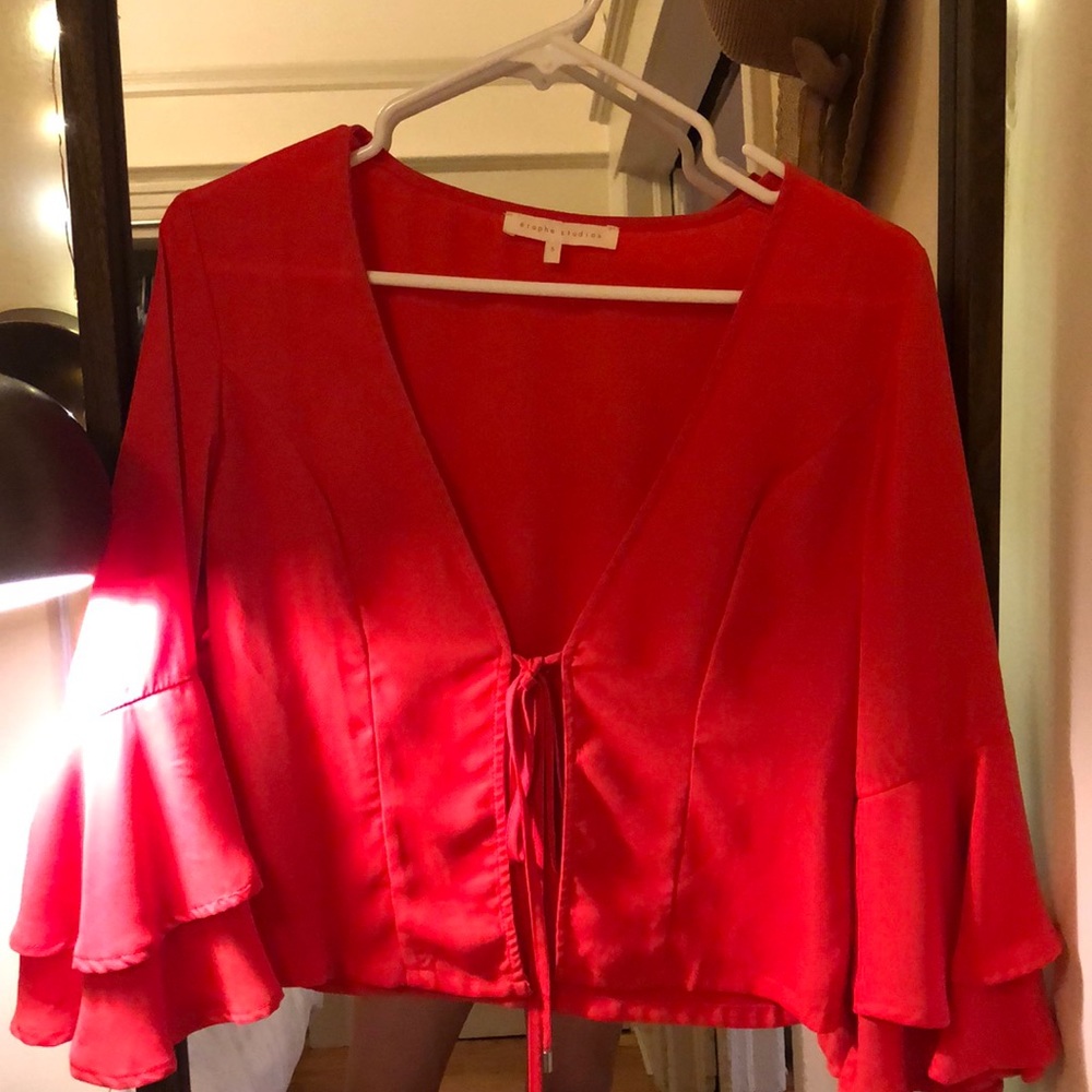 Red blouse with bell sleeves